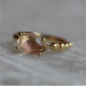 Sleeping goddess earring in 14k yellow gold with Oregon sunstone